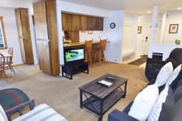 A comfortable downstairs one bedroom corner unit with light and trees, #105 - Image 3