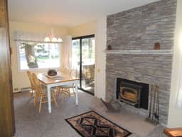 #127 Warm and inviting corner unit across from the shuttle stop and close to the Village - Image 3
