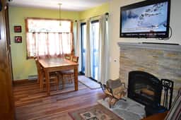 Feel at home with inviting corner condo, close to shuttle stops and The Village - Image 3