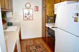 Feel at home with inviting corner condo, close to shuttle stops and The Village - Image 4