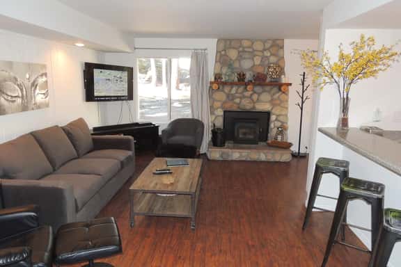 Modern corner condo #185, backs up to a treed lot - Image 1