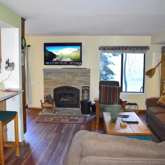 Feel at home with inviting corner condo, close to shuttle stops and The Village - Image 1