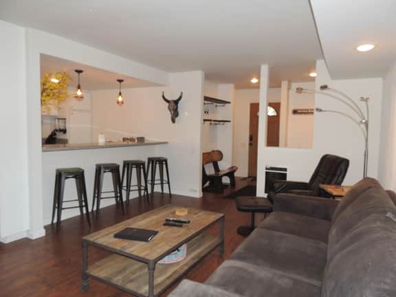 Modern corner condo #185, backs up to a treed lot - Image 2