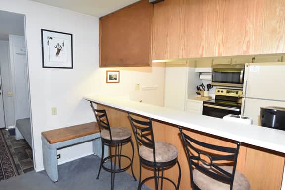 An upstairs bright unit just steps away from the free shuttle! #184 - Image 5