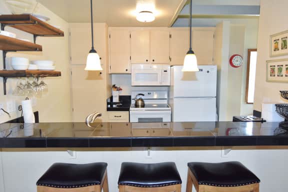 Bright corner condo overlooking the pool, #154 is steps from the shuttle - Image 5