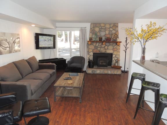 Modern corner condo #185, backs up to a treed lot - Image 1
