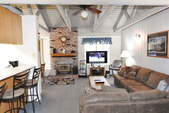 An upstairs bright unit just steps away from the free shuttle! #184 - Image 1
